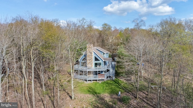 285 Cherry Heights Ln, Mc Henry, MD 21541 - back of property featuring a wooden deck, a chimney, and a wooded view