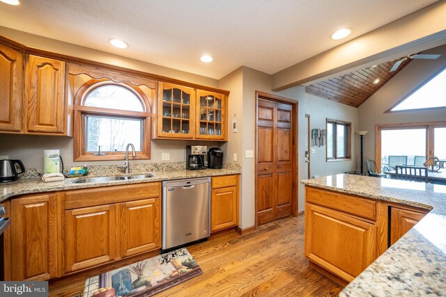 285 Cherry Heights Ln, Mc Henry, MD 21541 - kitchen featuring stainless steel dishwasher, a sink, light stone countertops, brown cabinets, and recessed lighting