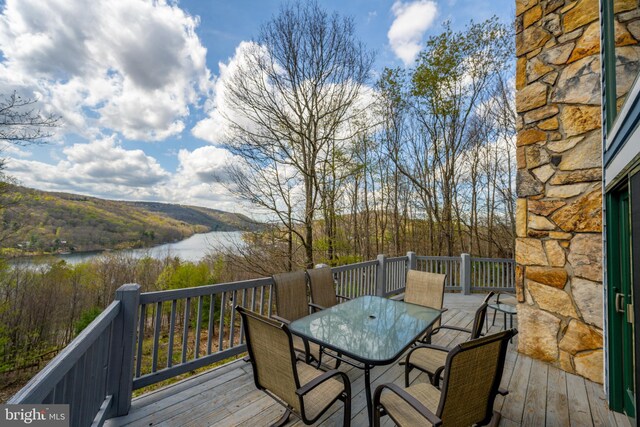 285 Cherry Heights Ln, Mc Henry, MD 21541 - wooden deck featuring outdoor dining area, a water view, and a forest view
