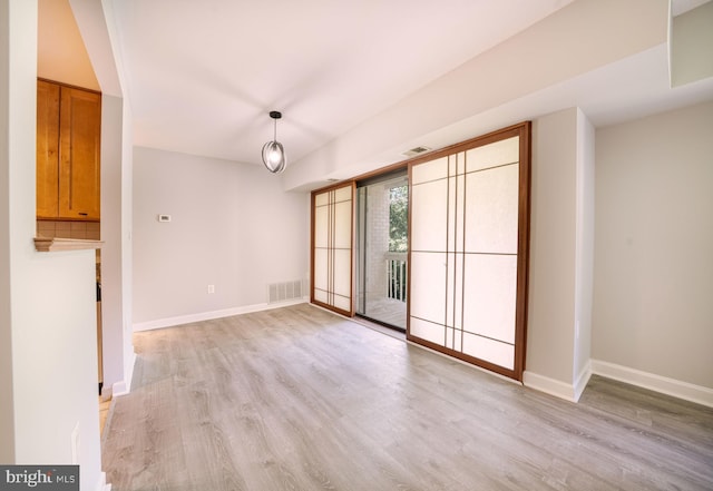 6305 Hil Mar Dr Unit 2-9, District Heights, MD 20747 - unfurnished room with light wood-style flooring and baseboards