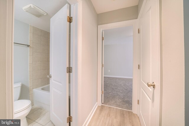 6305 Hil Mar Dr Unit 2-9, District Heights, MD 20747 - bathroom with toilet, baseboards, and wood finished floors