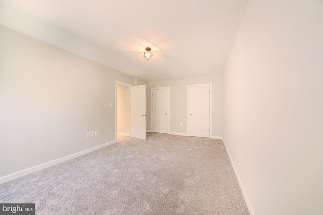 6305 Hil Mar Dr Unit 2-9, District Heights, MD 20747 - unfurnished bedroom with baseboards and carpet floors