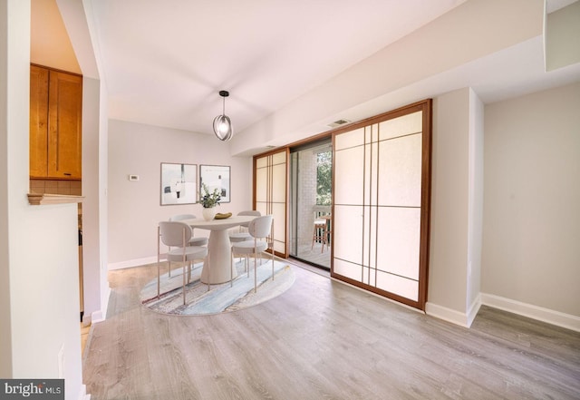 6305 Hil Mar Dr Unit 2-9, District Heights, MD 20747 - dining area featuring wood finished floors and baseboards