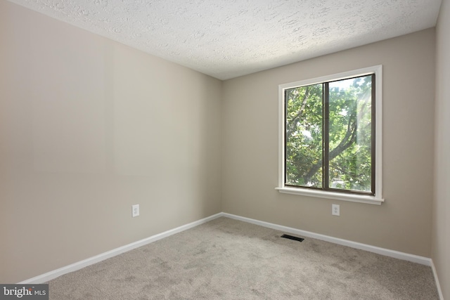 6 Keepsake Pl, Waldorf, MD 20602 - unfurnished room featuring a textured ceiling, carpet, and baseboards