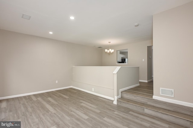 6 Keepsake Pl, Waldorf, MD 20602 - spare room with a chandelier, wood finished floors, baseboards, and recessed lighting