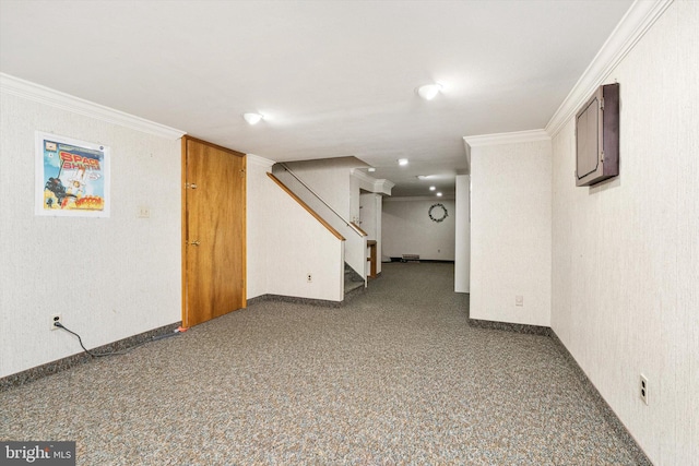 finished basement featuring carpet floors, stairway, crown molding, and baseboards