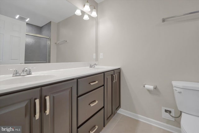 112 Veery Way, Port Matilda, PA 16870 - bathroom featuring toilet, tile patterned flooring, double vanity, a stall shower, and baseboards
