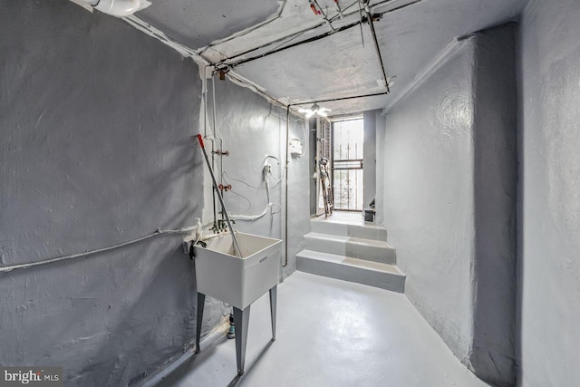 below grade area featuring a sink