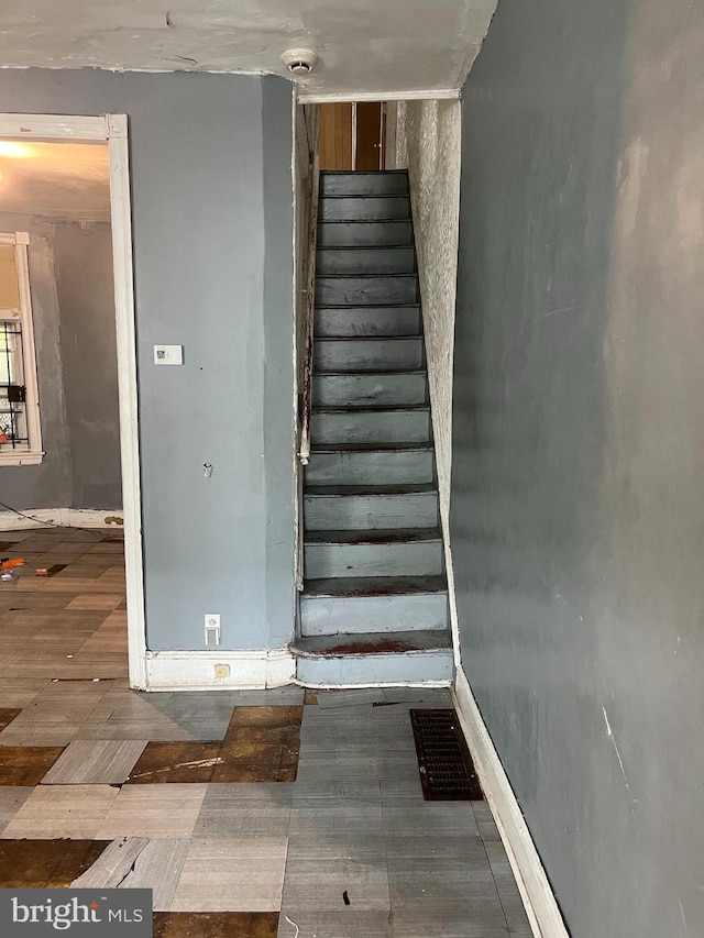 2918 N Taylor St, Philadelphia, PA 19132 - staircase featuring baseboards