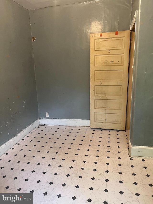 2918 N Taylor St, Philadelphia, PA 19132 - empty room featuring tile patterned floors and baseboards