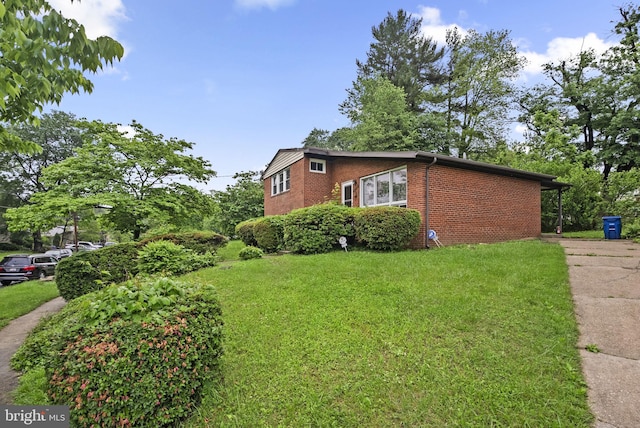 13111 Valleywood Dr, Silver Spring, MD 20906 - view of side of home featuring brick siding and a yard
