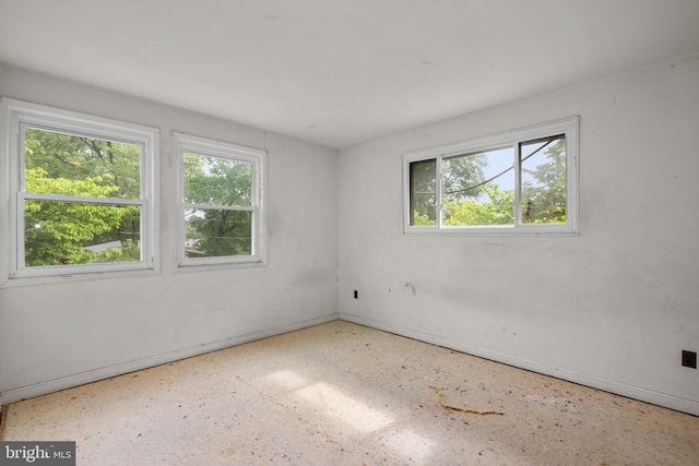 13111 Valleywood Dr, Silver Spring, MD 20906 - empty room with plenty of natural light and baseboards