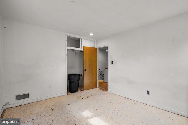 13111 Valleywood Dr, Silver Spring, MD 20906 - unfurnished bedroom featuring baseboards, a closet, concrete floors, and recessed lighting