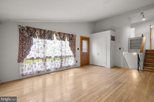 13111 Valleywood Dr, Silver Spring, MD 20906 - entryway featuring stairway, lofted ceiling, and light wood-style floors