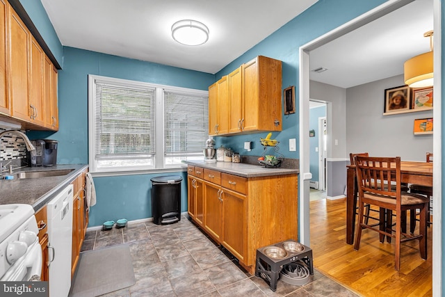 16 Bayberry Dr, Lanoka Harbor, NJ 08734 - kitchen featuring a sink, dishwasher, baseboards, stove, and a baseboard heating unit