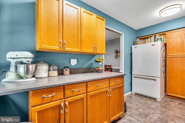 16 Bayberry Dr, Lanoka Harbor, NJ 08734 - kitchen with freestanding refrigerator and brown cabinetry
