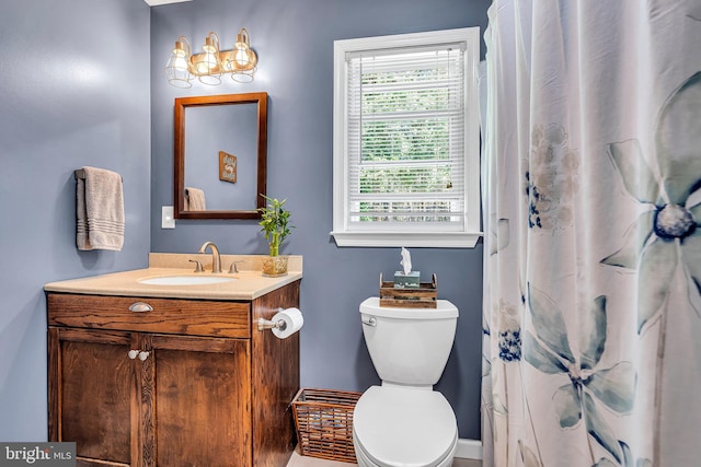 16 Bayberry Dr, Lanoka Harbor, NJ 08734 - bathroom featuring toilet, vanity, a shower with curtain, and baseboards