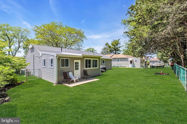 16 Bayberry Dr, Lanoka Harbor, NJ 08734 - rear view of house with roof with shingles and central AC unit