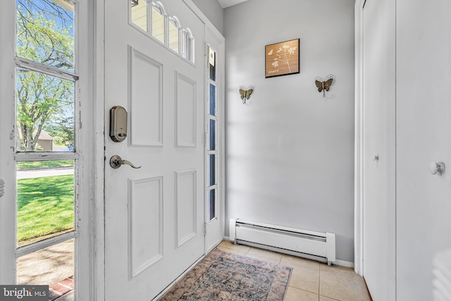16 Bayberry Dr, Lanoka Harbor, NJ 08734 - entryway featuring a baseboard heating unit, light tile patterned floors, plenty of natural light, and baseboards