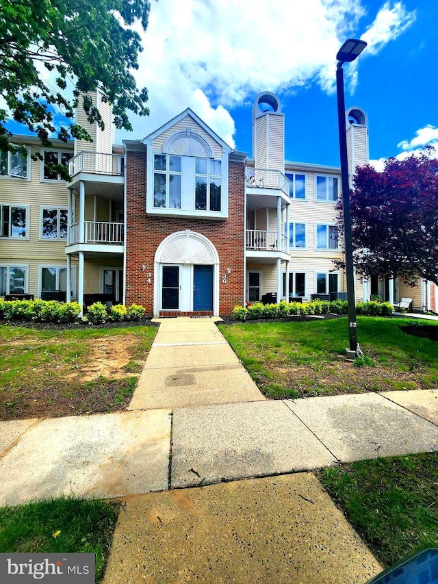 36 Lauren Ct, Levittown, PA 19057 - view of front facade featuring brick siding