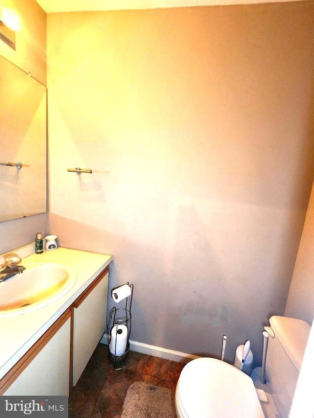 36 Lauren Ct, Levittown, PA 19057 - half bathroom with toilet, vanity, and baseboards