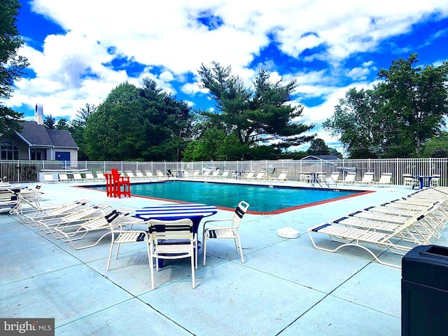36 Lauren Ct, Levittown, PA 19057 - community pool with fence and a patio area