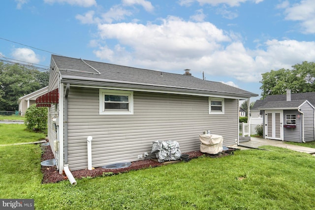 337 W Perry St, Enola, PA 17025 - rear view of house with an outdoor structure and a shed
