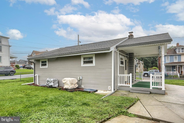 337 W Perry St, Enola, PA 17025 - view of property exterior featuring a chimney and roof with shingles
