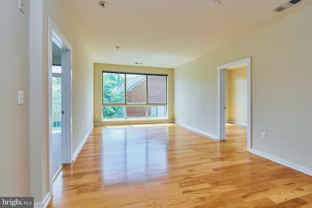 2200 N Westmoreland St Unit 325, Arlington, VA 22213 - empty room with light wood-style flooring and baseboards