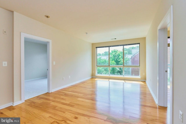 2200 N Westmoreland St Unit 325, Arlington, VA 22213 - empty room featuring light wood-style flooring