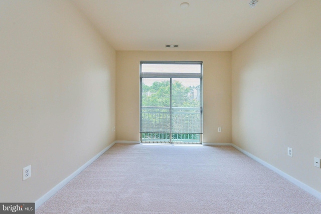 2200 N Westmoreland St Unit 325, Arlington, VA 22213 - unfurnished room featuring light colored carpet and baseboards