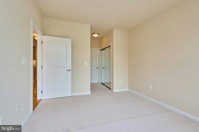 2200 N Westmoreland St Unit 325, Arlington, VA 22213 - unfurnished bedroom with light colored carpet and a closet