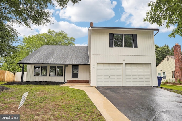 44 Concord Rd, Marlton, NJ 08053 - view of front of house with driveway, an attached garage, a chimney, and roof with shingles