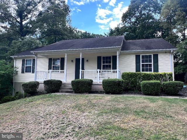 38077 E Edinview Ct, Mechanicsville, MD 20659 - view of front of property with a porch and a front yard