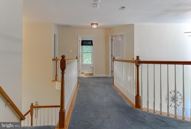 9150 Sparkling Pl, Charlotte Hall, MD 20622 - corridor with an upstairs landing, carpet floors, and baseboards
