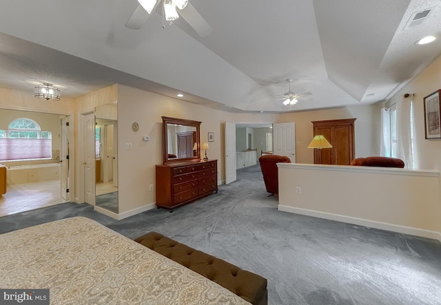 9150 Sparkling Pl, Charlotte Hall, MD 20622 - carpeted living area with ceiling fan, baseboards, recessed lighting, and a tray ceiling