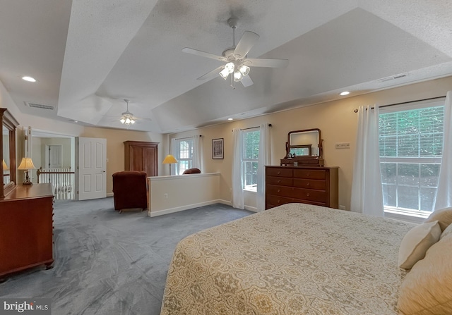9150 Sparkling Pl, Charlotte Hall, MD 20622 - carpeted bedroom featuring a raised ceiling, vaulted ceiling, baseboards, recessed lighting, and ceiling fan