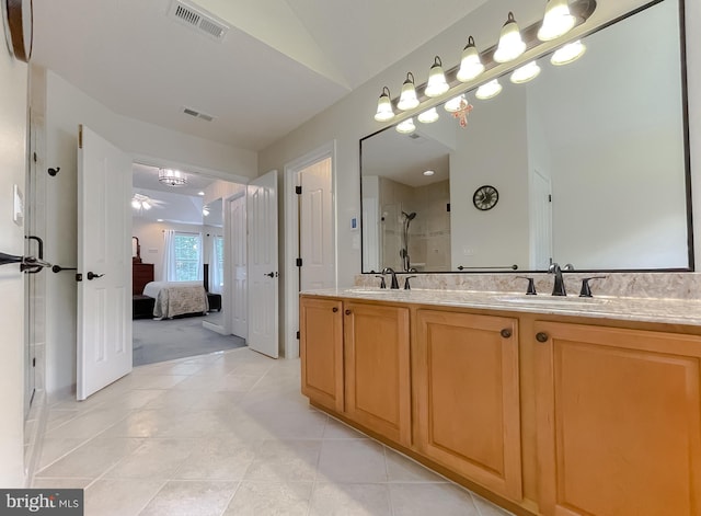 9150 Sparkling Pl, Charlotte Hall, MD 20622 - ensuite bathroom featuring a stall shower, double vanity, and tile patterned floors
