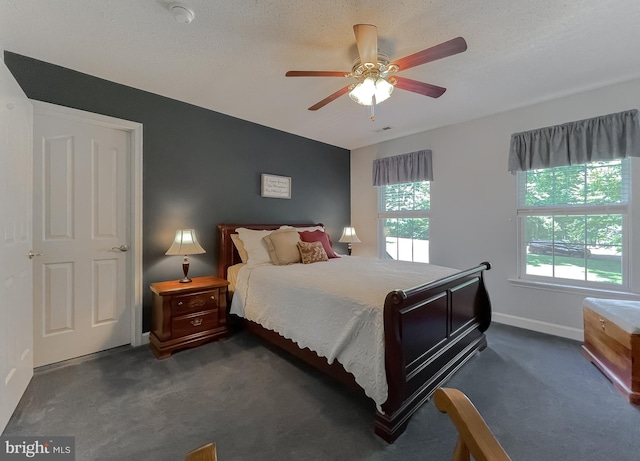 9150 Sparkling Pl, Charlotte Hall, MD 20622 - bedroom with dark colored carpet, baseboards, and ceiling fan