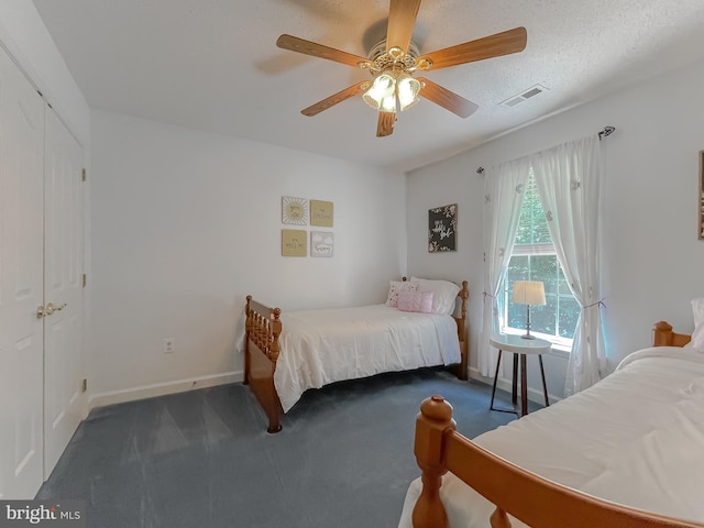 9150 Sparkling Pl, Charlotte Hall, MD 20622 - carpeted bedroom featuring baseboards, a ceiling fan, and access to exterior