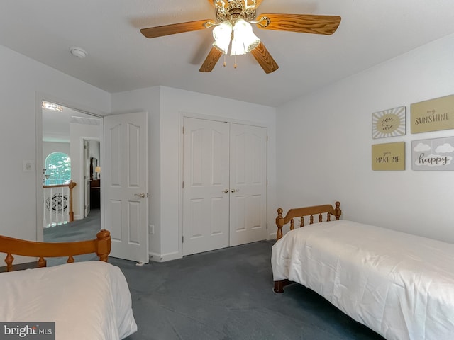 9150 Sparkling Pl, Charlotte Hall, MD 20622 - bedroom with dark carpet, a closet, ceiling fan, and baseboards