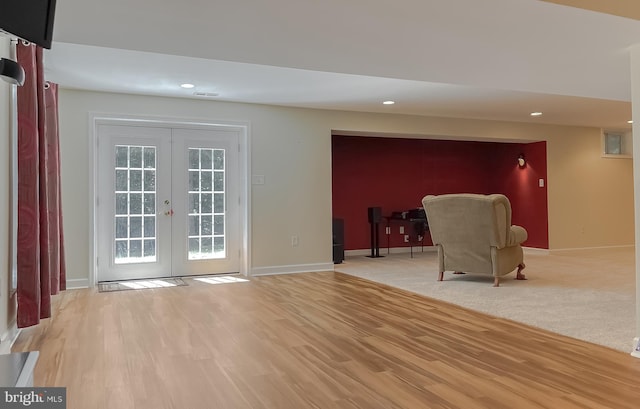 9150 Sparkling Pl, Charlotte Hall, MD 20622 - living area with recessed lighting, french doors, baseboards, and light wood-style floors