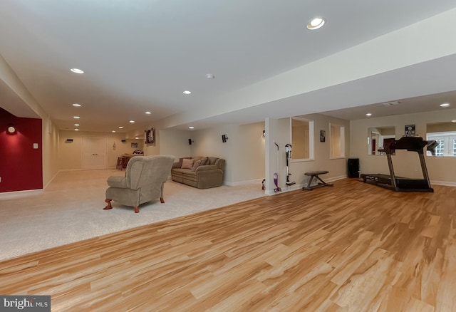 9150 Sparkling Pl, Charlotte Hall, MD 20622 - living room with wood finished floors, baseboards, and recessed lighting