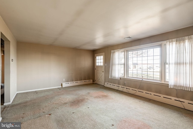904 W Main St, New Holland, PA 17557 - spare room featuring a baseboard radiator, carpet flooring, and baseboards