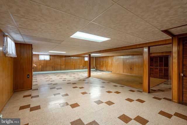 904 W Main St, New Holland, PA 17557 - finished below grade area with tile patterned floors, wood walls, and a drop ceiling
