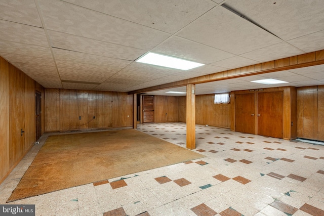 904 W Main St, New Holland, PA 17557 - finished basement with light flooring, wood walls, and a paneled ceiling