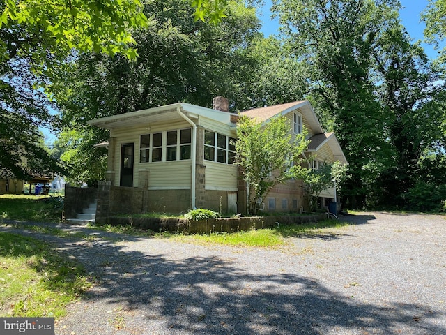 1812 64th Ave, Landover, MD 20785 - view of front of property with driveway and a chimney