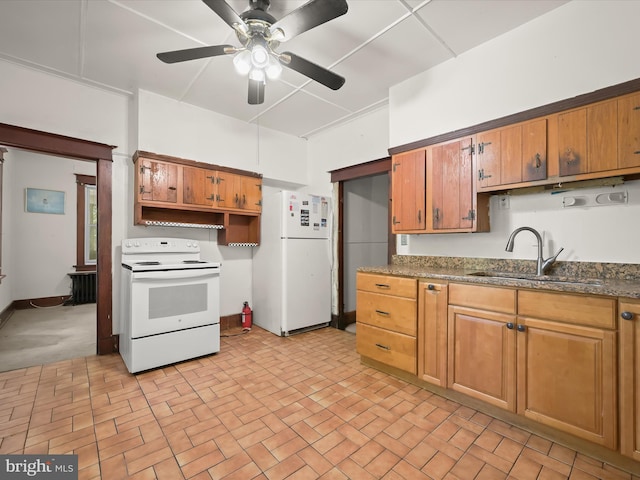1812 64th Ave, Landover, MD 20785 - kitchen featuring white appliances, a sink, a ceiling fan, brick patterned floors, and brown cabinets