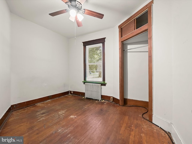 1812 64th Ave, Landover, MD 20785 - unfurnished bedroom with radiator, wood-type flooring, baseboards, and a ceiling fan
