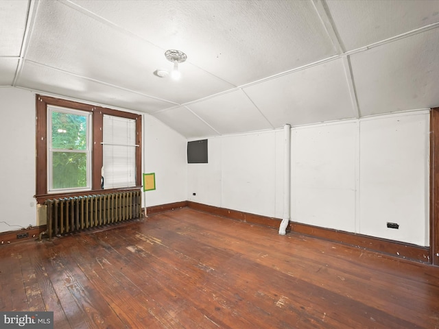 1812 64th Ave, Landover, MD 20785 - additional living space with radiator heating unit, hardwood / wood-style floors, lofted ceiling, and baseboards